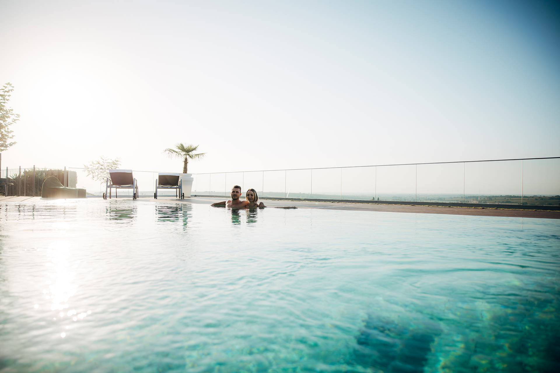 Couple in the outdoor Pool at Leinsweiler Hof Pfalz